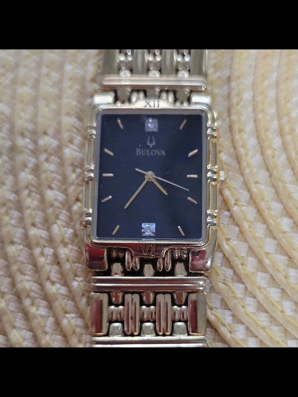 Bulova Gold-Tone Rectangular Watch with Black Dial